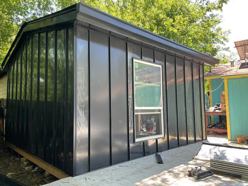 Black standing seam metal wall panels for Metal Roof Installation in Winter Park