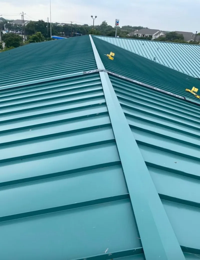 Green commercial metal roof ridge and valley for Metal Roof Repair in Winter Park